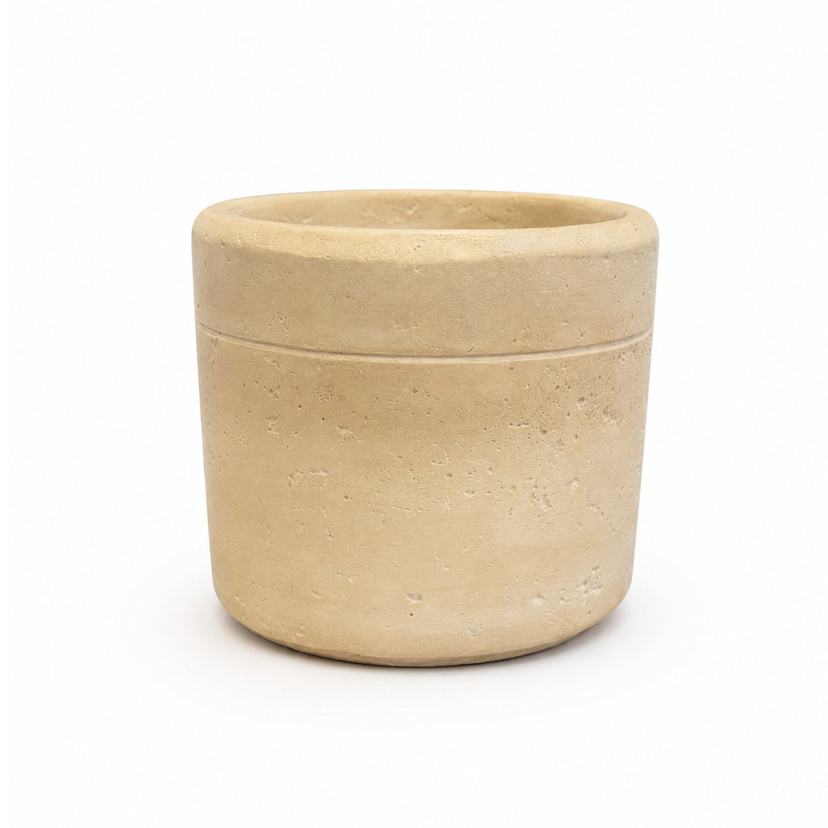 A small cylindrical container or planter made of natural stone, featuring a light beige textured surface and a horizontal seam around the middle, set against a plain white background.