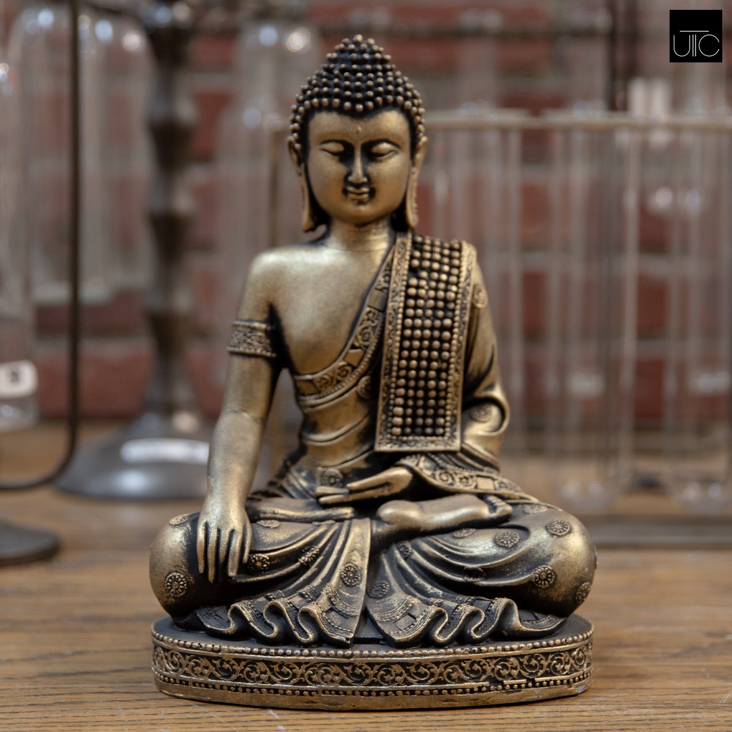 Deirdre Cement Meditating Buddha Figurine in Bhumisparsha Mudra with Shoulder Sash on Base