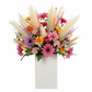 Rectangular ceramic vase with wavy texture on a white background