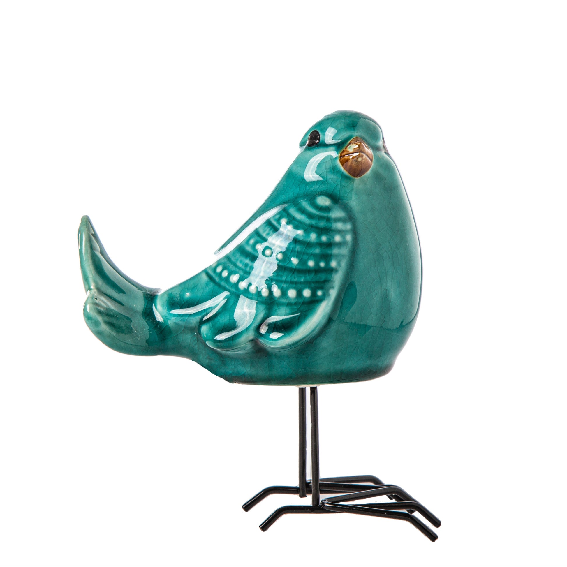 Turquoise ceramic bird figurine on a stand against a white background
