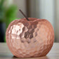 A ceramic apple figurine with a matte silver finish and a hammered design texture, featuring a stem.