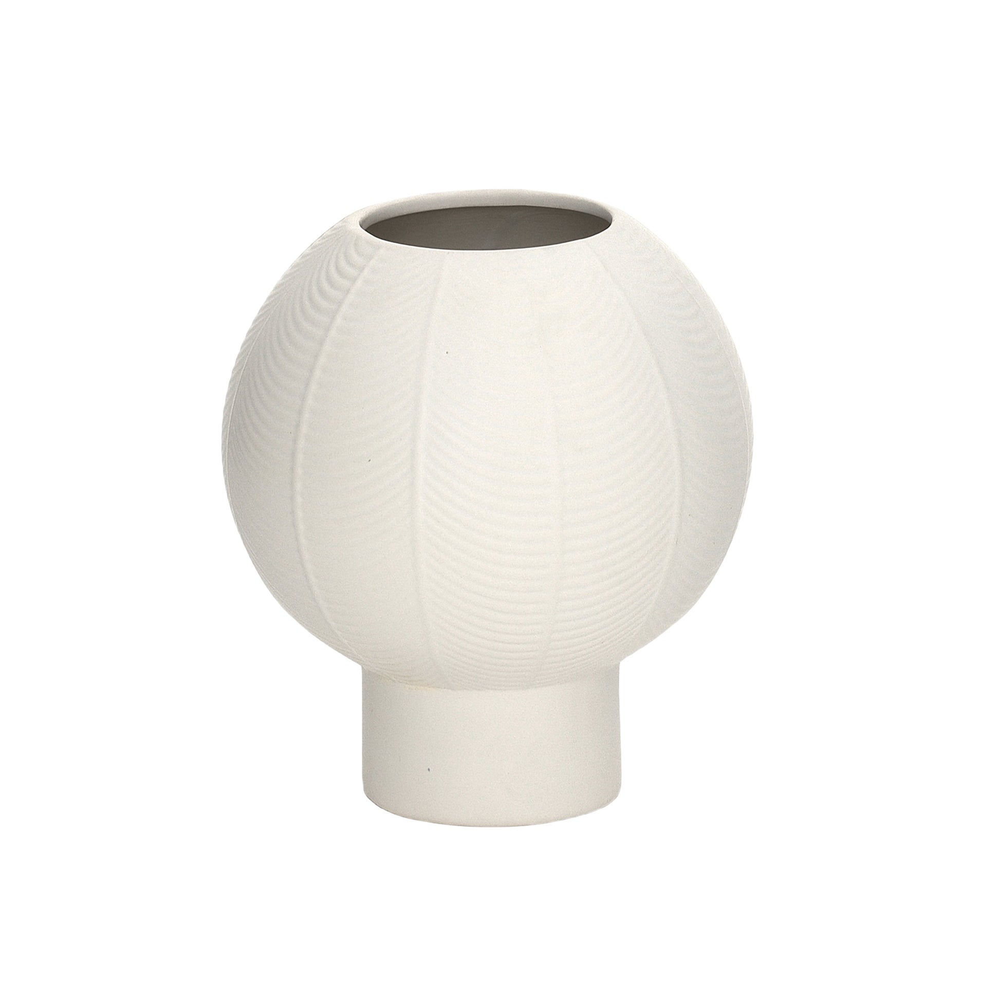 A matte white ceramic round vase with an embossed column and stripe design on the base.