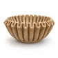 Brown ceramic bowl with textured design on a white background