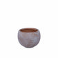 Round textured pot on a white background