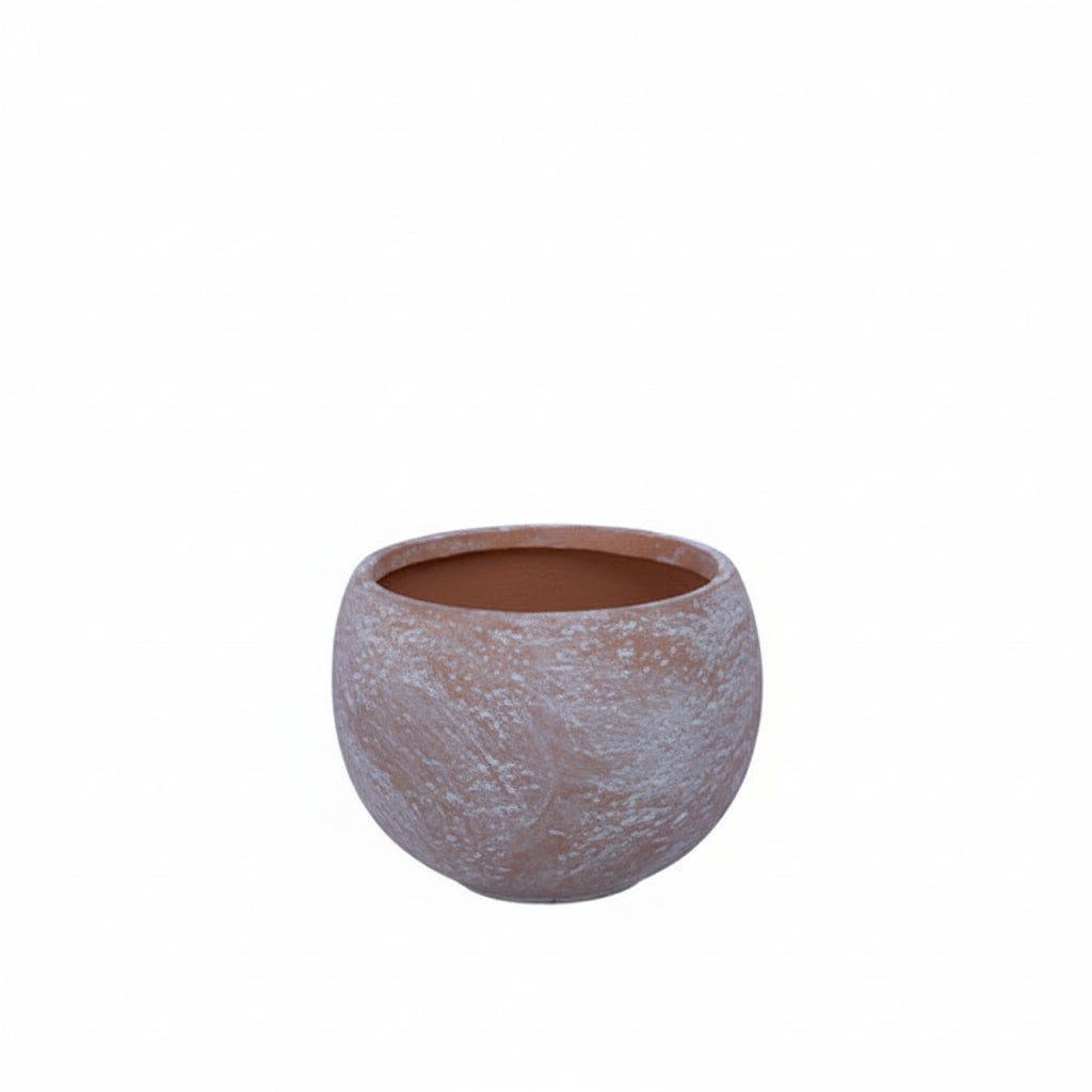 Round textured pot on a white background