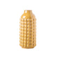 Yellow ceramic round vase with an embossed bubbled pattern design.