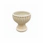 Off White ceramic planter with ribbed texture on a white background