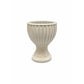 Decorative ribbed vase on a white background