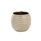 Textured ceramic vase on a white background