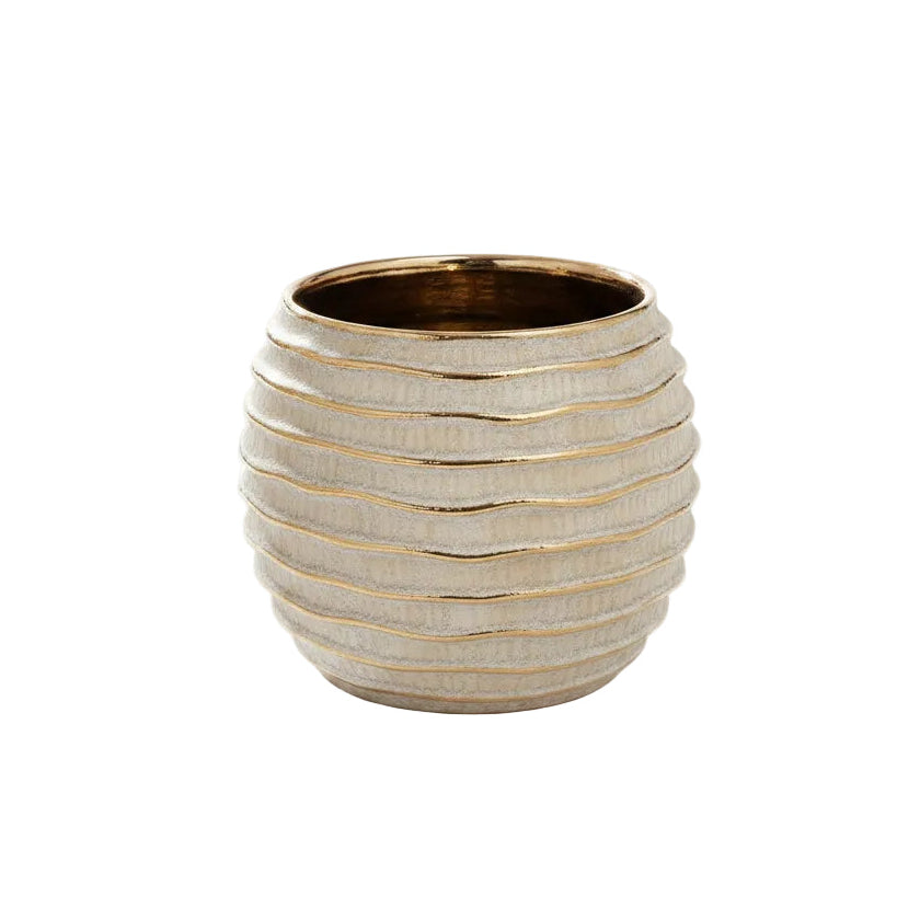 Textured ceramic vase on a white background