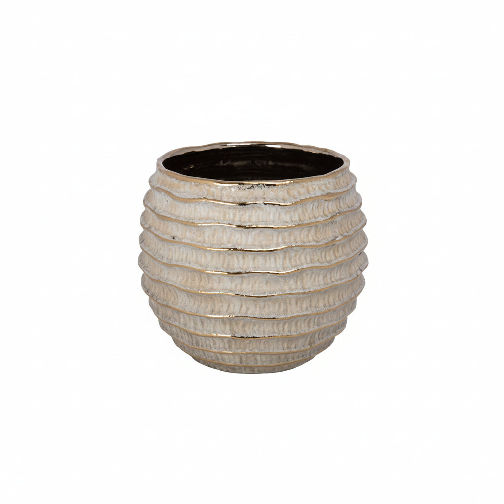 Textured ceramic pot on a white background
