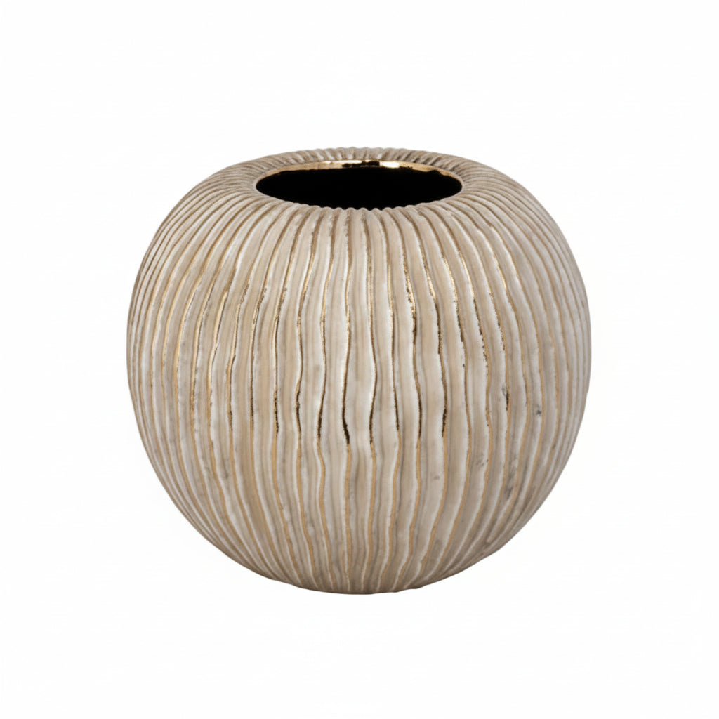 A round ceramic planter pot with a textured, vertically ribbed surface in a warm beige and cream tone, featuring a dark interior opening, set against a plain white background.