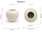 A white ceramic vase shown with front and top views and dimension labels on a white background. The image includes text reading ITEM 33511 and measurements for height, width, opening diameter, and length.