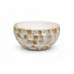 Decorative bowl with shell pattern on a white background