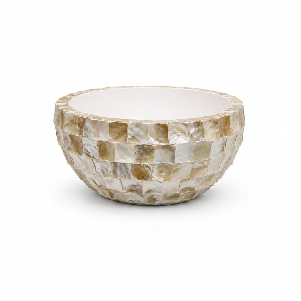 Decorative bowl with shell pattern on a white background