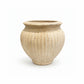 An antique-style beige ceramic pot with a ribbed fluted texture and a wide rim, shown on a plain white background.
