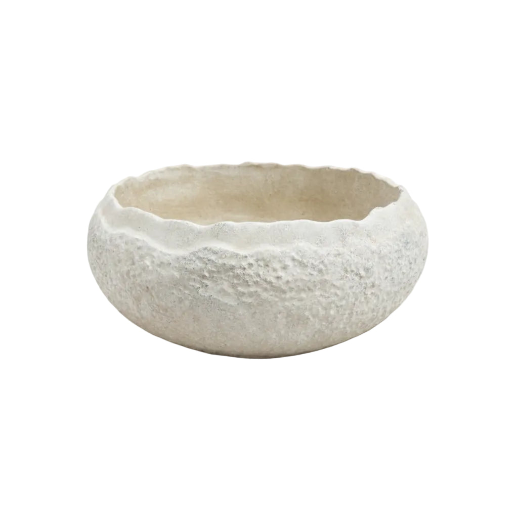 White ceramic bowl with textured surface on a white background