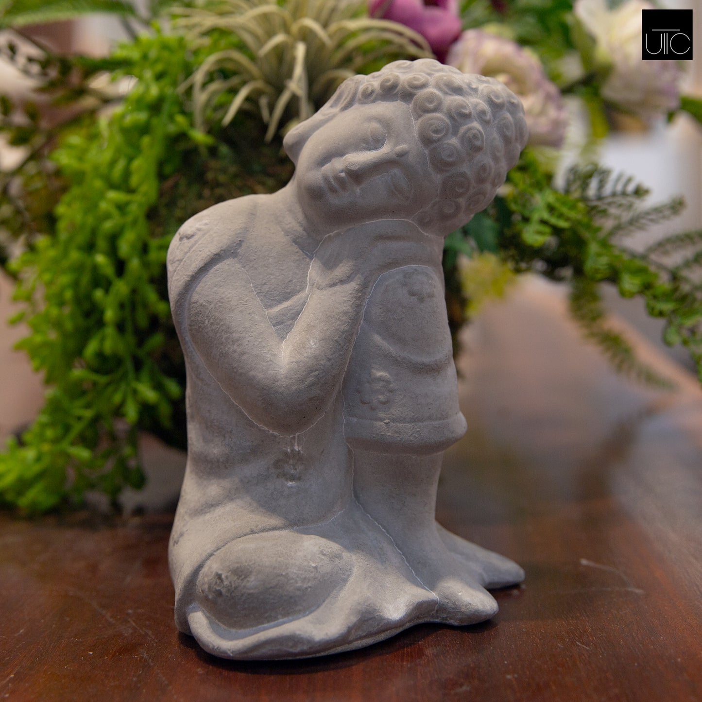 Isran Resting Head Buddha Figurine
