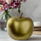 Gold apple on a white background