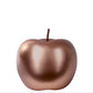 Bronze-colored apple on a white background