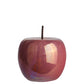 A polished pearlescent finish ceramic apple figurine with a stem.