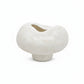 A mushroom-shaped ceramic planter with a textured, speckled off-white finish, set against a plain white background.