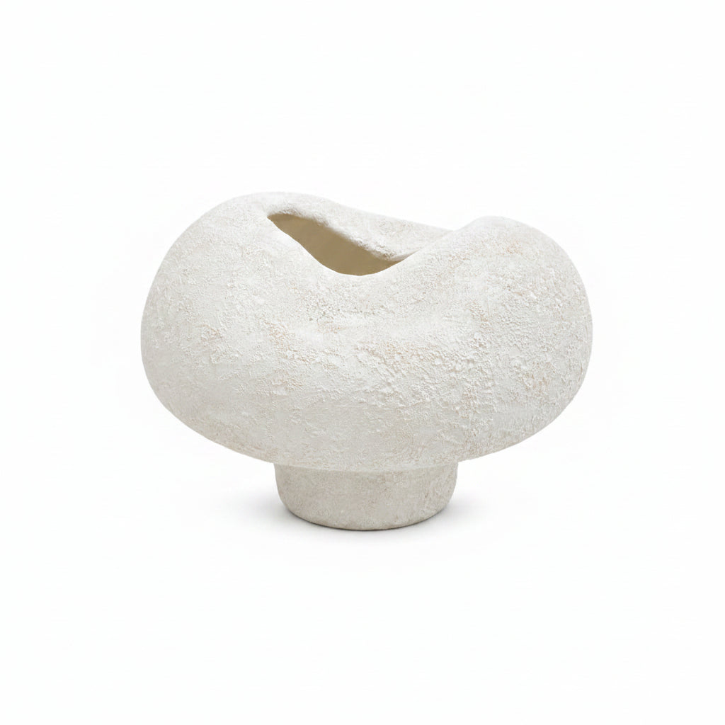 A mushroom-shaped ceramic planter with a textured, speckled off-white finish, set against a plain white background.