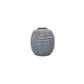 A blue ceramic vase with a glossy finish and a ribbed texture, displayed against a white background.