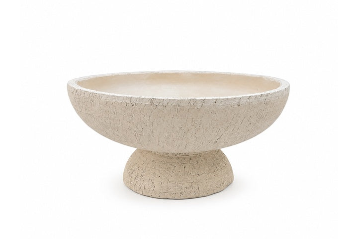 Beige ceramic bowl on a white background