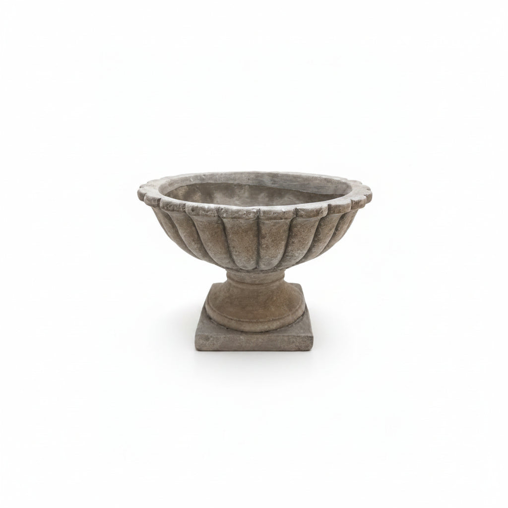 Decorative stone urn on a white background