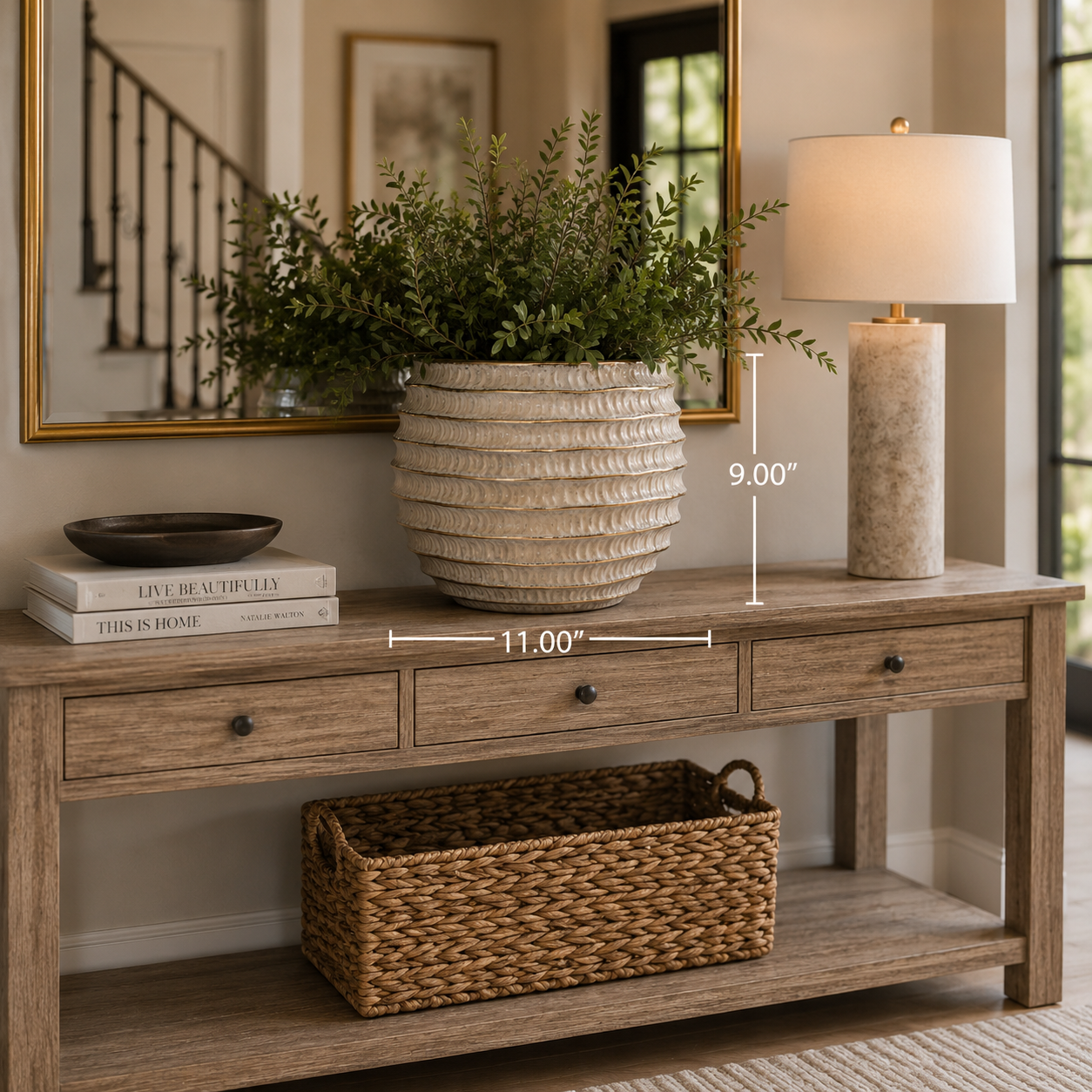 A rustic wood console table shown in a styled interior with overlaid dimension lines indicating 11.00 inches width and 9.