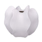 White ceramic vase with a unique design on a white background
