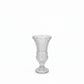 A clear glass pedestal vase with a flared rim and vertical ribbed detailing, shown on a plain white background.