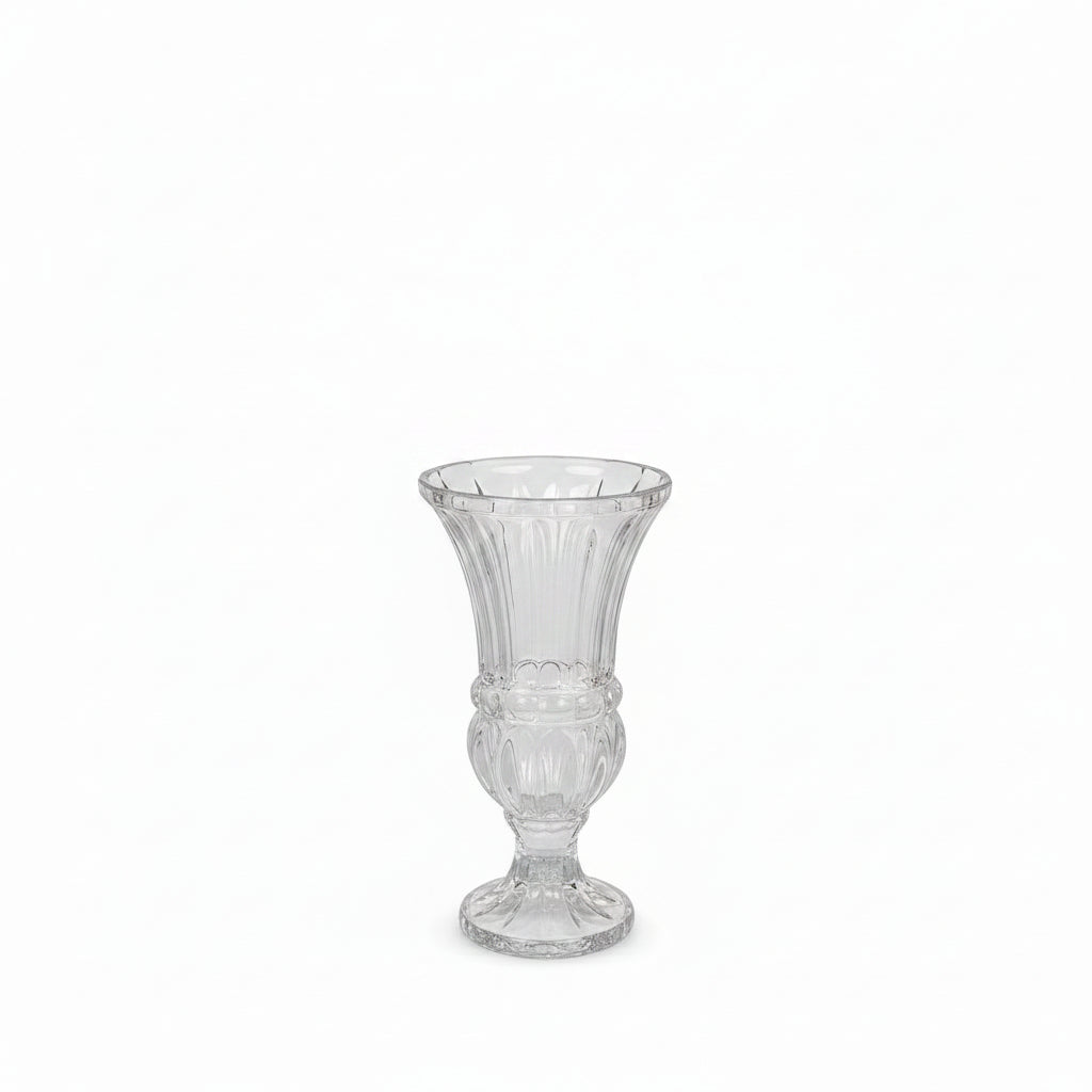 A clear glass pedestal vase with a flared rim and vertical ribbed detailing, shown on a plain white background.